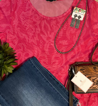 Lightweight hot pink stretch mesh top with western-inspired detailing and round neckline.