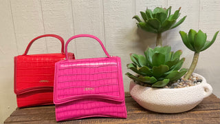 Compact crocodile embossed vegan leather bag with removable crossbody strap and gold accents