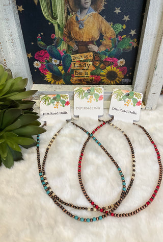 Lightweight copper necklace with small beads and subtle pops of color