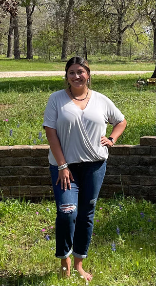 Lightweight flowy crepe blouse styled with denim for effortless boutique fashion