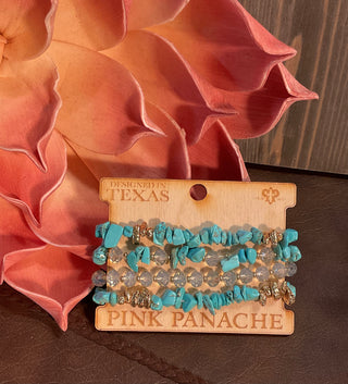 Multi-strand beaded bracelet stack with dyed stone chips, faceted crystal beads, and gold-tone nugget accents