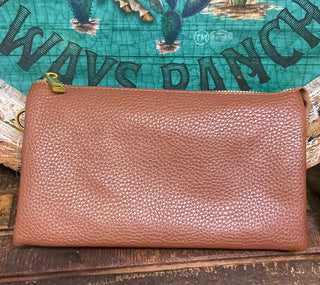 Selma Convertible Bag in textured faux leather with gold-tone fixtures – versatile clutch, wristlet, or crossbody with three zippered compartments and two card slots for organized day-to-night style.
