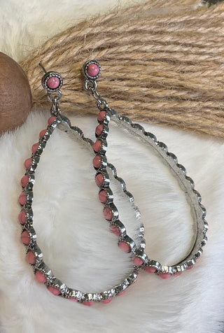 Silver-tone teardrop earrings with ornate detailing and colored center stones, available in pink; approx. 2.75" long