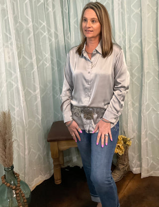 Women's silky button-up blouse with polished satin finish