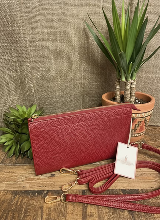 Pebbled faux leather convertible crossbody bag with wristlet and clutch styling options