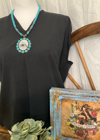 Statement western necklace with vintage style pendant and turquoise detailing