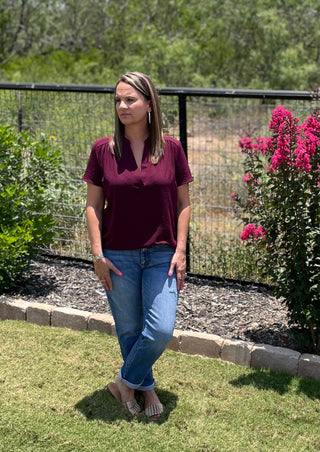 Women's versatile v-neck top styled with denim for everyday wear