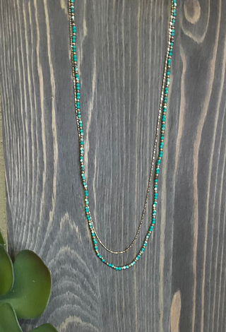 gold layered necklace with turquoise bead accents double strand jewelry