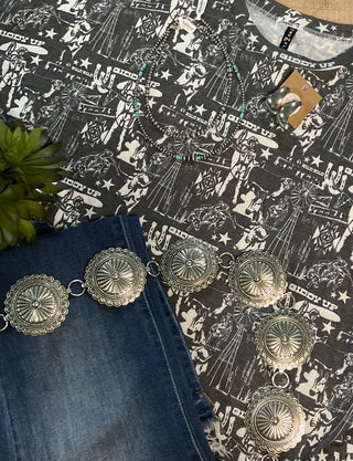 Charcoal grey long-sleeve top with a western collage print, relaxed fit, made from a 60% cotton and 40% polyester blend.