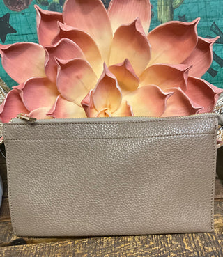 Pebbled faux leather convertible crossbody bag with wristlet and clutch styling options