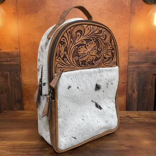 Hair-on hide western backpack with floral tooled leather and three zippered compartments