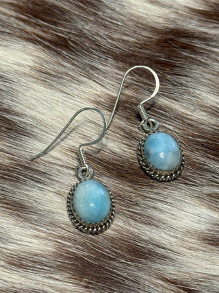 Sterling silver Larimar oval drop earrings with soft blue stone and white marbling western boutique jewelry