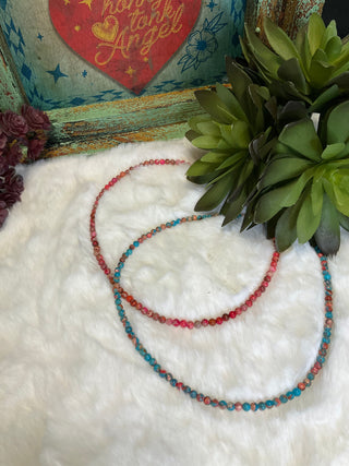 Colorful beaded choker necklace in hot pink and turquoise layered jewelry look