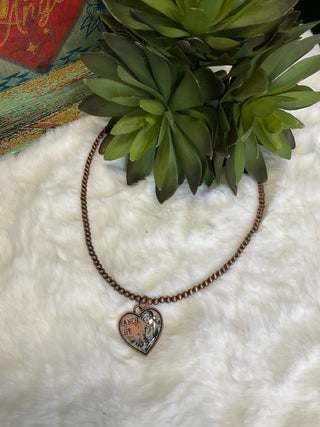 faux copper bead necklace with western graphic pendant ranch style jewelry