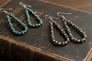 Silver-tone teardrop earrings with textured beaded detail and choice of burnished silver-tone or turquoise-colored accents