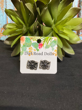Silver-tone ornate post earrings with black center stone and western boutique style