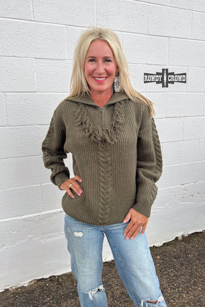 olive quarter zip pullover sweater with frayed accent at base of zipper and cable knit stripe down sleeve