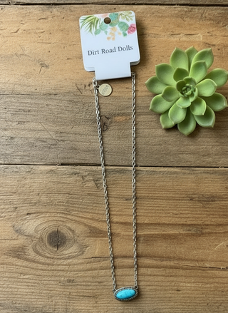 silver necklace with oval turquoise pendant minimalist western jewelry