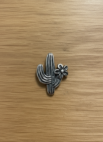 Dainty sterling silver saguaro cactus stud earrings with tiny blooming detail, minimal western design.