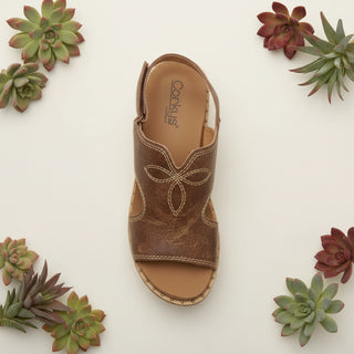 Cognac cork wedge sandal with western stitch embroidery, open toe, and slingback adjustable strap