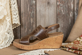 Cognac cork wedge sandal with western stitch embroidery, open toe, and adjustable slingback strap