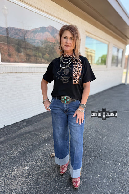 Black Seminole Canyon Top with cream Aztec-inspired stitch design – lightweight short sleeve women’s top with relaxed fit, perfect for casual or dressed-up western style
