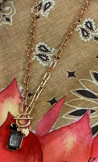 Adjustable gold toggle necklace with crystal pendant in multiple colors
