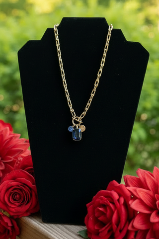 Adjustable gold toggle necklace with crystal pendant in multiple colors
