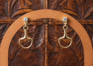 Gold snaffle bit drop earrings with rhinestone post backs