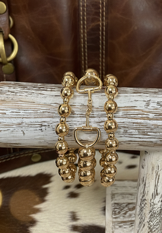 Water-resistant three-piece gold stretch bracelet set