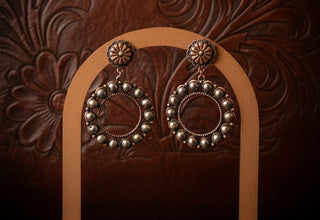 Copper toned western concho drop earrings with AB center stones and open circular bead detailing