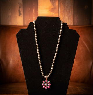Silver toned beaded necklace with faux cotton candy dahlia floral pendant